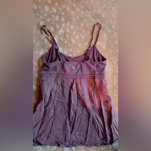 I’m selling a Lululemon tank-top! It comes with a built in bra and it’s purple! - Picture 2 of 2
